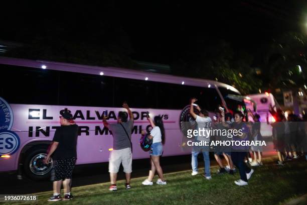 Fans greet the Miami FC players with Lionel Messi arriving on a bus outside the Real Intercontinental Hotel on January 19, 2024 in San Salvador, El...