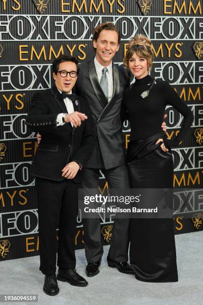 Ke Huy Quan, Tom Hiddleston and Sophia Di Martino attend the 75th Primetime Emmy Awards at Peacock Theater on January 15, 2024 in Los Angeles,...