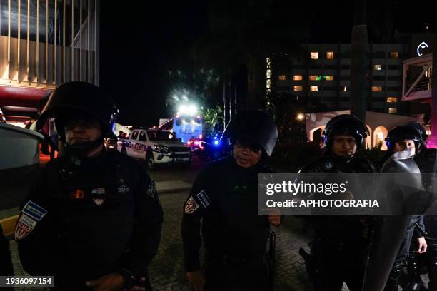 Riot police officers guard the Miami FC team hotel on January 19, 2024 in San Salvador, El Salvador.