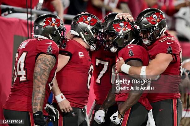 David Moore of the Tampa Bay Buccaneers celebrates with his teammates after scoring a 44 yard touchdown against the Philadelphia Eagles during the...