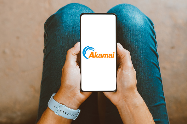 In this photo illustration, the Akamai Technologies logo is...