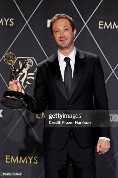 Ebon Moss-Bachrach, winner of the Outstanding Supporting Actor in a Comedy Series award for "The Bear," poses in the press room during the 75th...