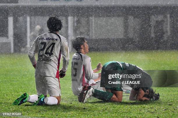 Shingo Akamine and Daiki Iwamasa of Fagiano Okayama celebrate the team advances to the final following the 2-1 victory in the J.League J1 Promotion...