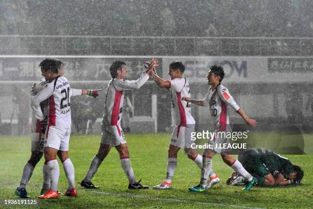 Fagiano Okayama players celebrate the team advances to the final following the 2-1 victory in the J.League J1 Promotion Play-Off semi final between...