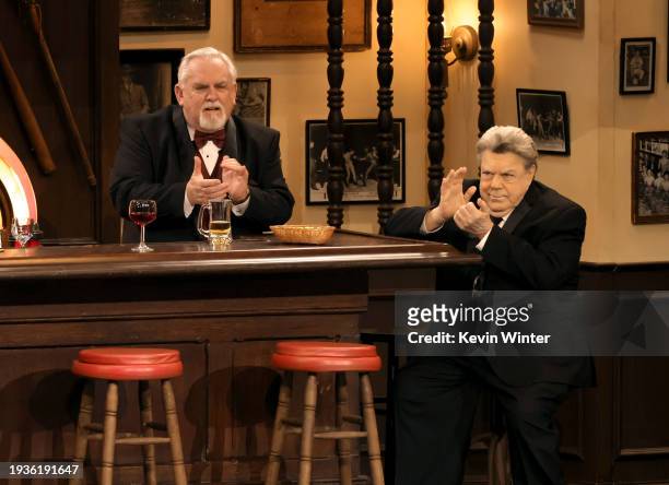 John Ratzenberger and George Wendt speak onstage during the 75th Primetime Emmy Awards at Peacock Theater on January 15, 2024 in Los Angeles,...