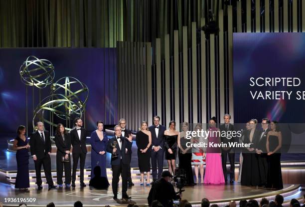 John Oliver , writers, and producers of “Last Week Tonight with John Oliver” accept the Outstanding Scripted Variety Series award onstage during the...