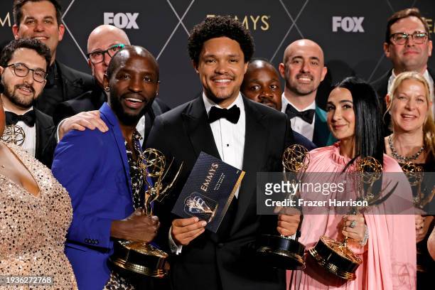Trevor Noah and winners of Outstanding Talk Series for "The Daily Show With Trevor Noah" pose in the press room during the 75th Primetime Emmy Awards...