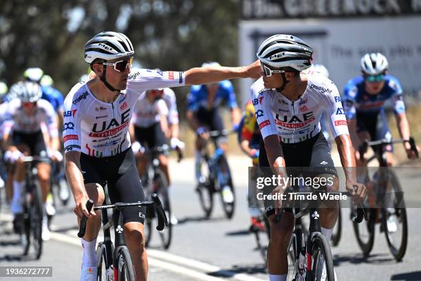 Michael Vink of New Zealand and Isaac Del Toro Romero of Mexico and UAE Team Emirates compete during the 24th Santos Tour Down Under 2024, Stage 1 a...