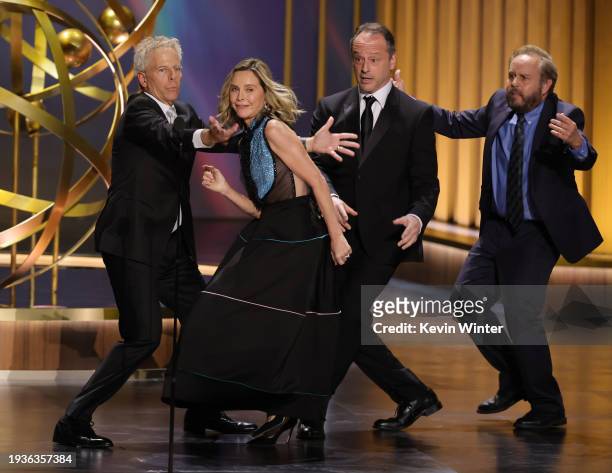Greg Germann, Calista Flockhart, Gil Bellows and Peter MacNicol dance onstage during the 75th Primetime Emmy Awards at Peacock Theater on January 15,...