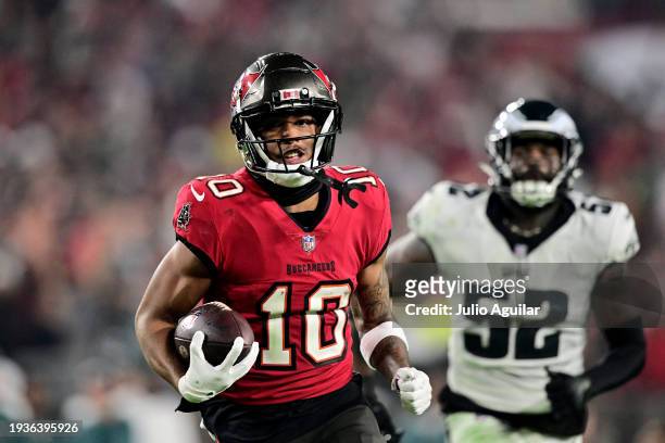 Trey Palmer of the Tampa Bay Buccaneers runs the ball to score a 56 yard touchdown against the Philadelphia Eagles during the third quarter in the...