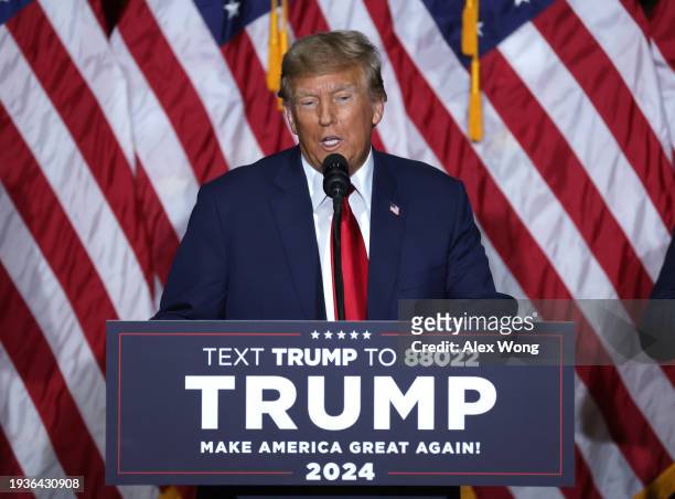 Former President Donald Trump speaks at his caucus night event at the Iowa Events Center on January 15, 2024 in Des Moines, Iowa. Iowans voted today...