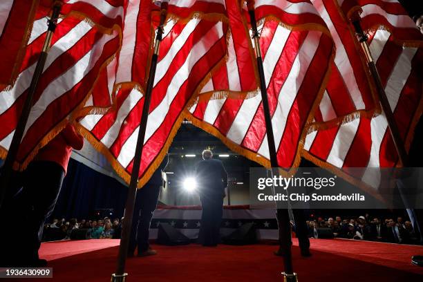 Former President Donald Trump speaks at his caucus night event at the Iowa Events Center on January 15, 2024 in Des Moines, Iowa. Iowans voted today...