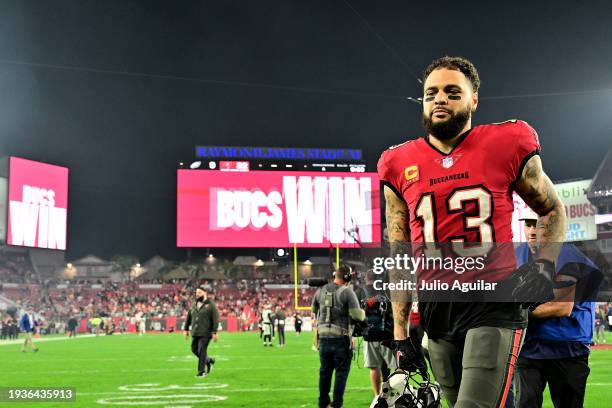 Mike Evans of the Tampa Bay Buccaneers runs off the field after defeating the Philadelphia Eagles in the NFC Wild Card Playoffs at Raymond James...