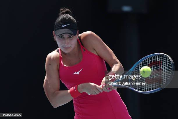 Oceane Dodin of France plays a backhand in their round one singles match against Lin Zhu of China during the 2024 Australian Open at Melbourne Park...