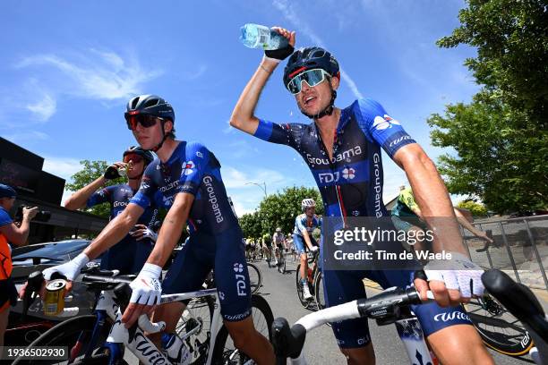 Reuben Thompson of New Zealand, Laurence Pithie of New Zealand, Rudy Molard of France and Team Groupama-FDJ cool down after the 24th Santos Tour Down...