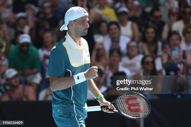 Grigor Dimitrov of Bulgaria celebrates match point in their round one singles match against Marton Fucsovics of Hungary during the 2024 Australian...