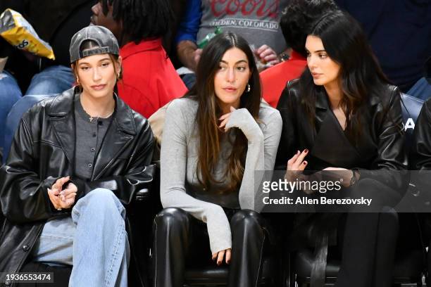 Hailey Bieber, Sarah Staudinger and Kendall Jenner attend a basketball game between the Los Angeles Lakers and the Oklahoma City Thunder at...