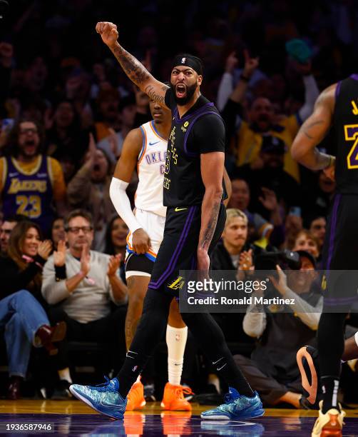 Anthony Davis of the Los Angeles Lakers reacts after a slam dunk against the Oklahoma City Thunder in the second half at Crypto.com Arena on January...