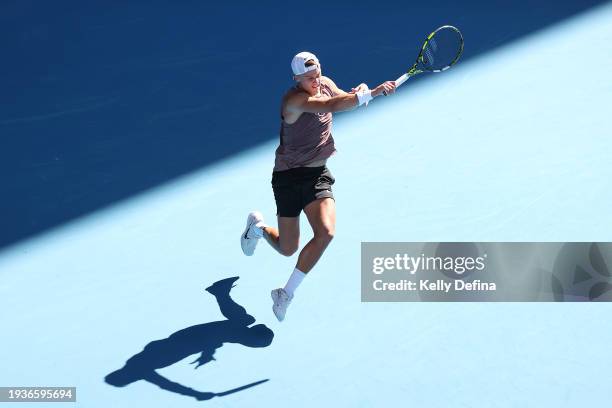 Holger Rune of Denmark plays a forehand in their round one singles match against Yoshihito Nishioka of Japan during the 2024 Australian Open at...