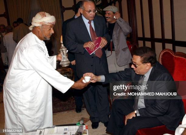 Egyptian renowned comedian Adel Imam is welcomed after giving a press conference at "Grand Hayat Muscat" hotel 25 December 2001 in Muscat. Imam...