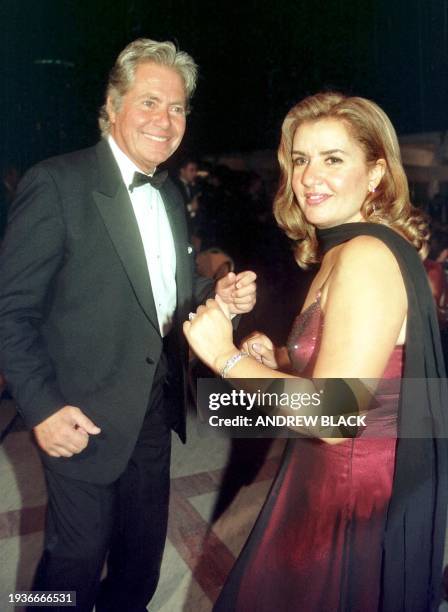 Egyptian film star Hussein Fahmi and his wife Hala Fathi dance during a party to celebrate the opening of the 25th Cairo International Film Festival...