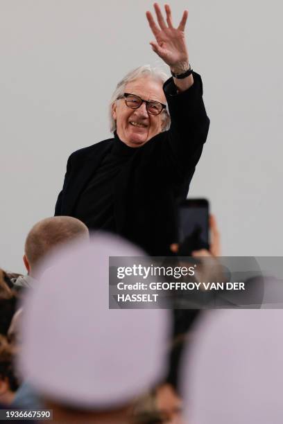 British designer Paul Smith acknowledges applause after presenting creations from his Menswear Ready-to-wear Fall-Winter 2024/2025 collection as part...