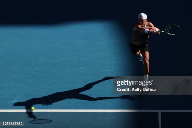 Holger Rune of Denmark plays a forehand in their round one singles match against Yoshihito Nishioka of Japan during the 2024 Australian Open at...
