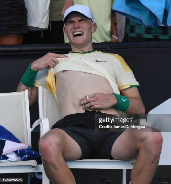 Jack Draper of Great Britain screams in pain after winning in their round one singles match against Marcos Giron of the United States during the 2024...
