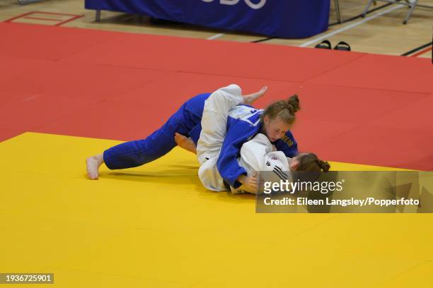 Summer Shaw and Amelia Alder competing in round three of the -48kg category during the Senior British Judo Championships at the English Institute of...