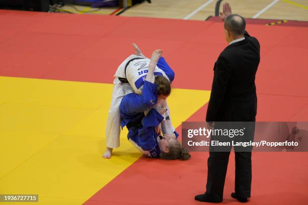 Summer Shaw and Amelia Alder competing in round three of the -48kg category during the Senior British Judo Championships at the English Institute of...