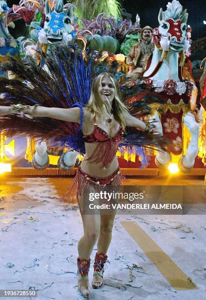 Brazilian model and actress, Susana Werner dances the second day of the carnival parade at the Marques de Sapucai sambadrome in Rio de Janeiro,...