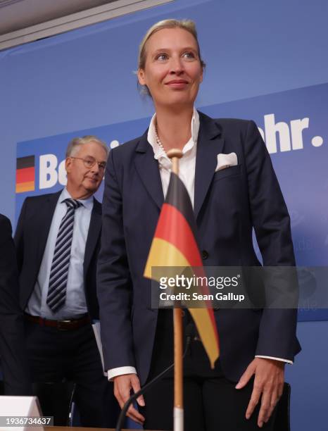 Alice Weidel , co-head of the far-right Alternative for Germany political party, and her advisor Roland Hartwig arrive for a press conference the day...
