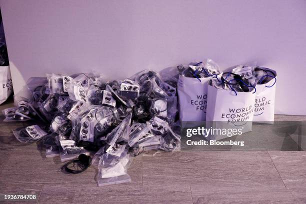 Packets of unused headsets in the Congress Hall on the closing day of the World Economic Forum in Davos, Switzerland, on Friday, Jan. 19, 2024. The...