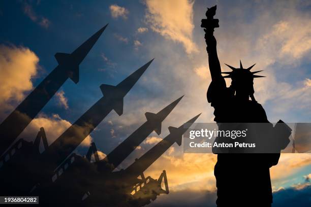 missile system on the background of statue of liberty. usa - intercontinental ballistic missile stock pictures, royalty-free photos & images
