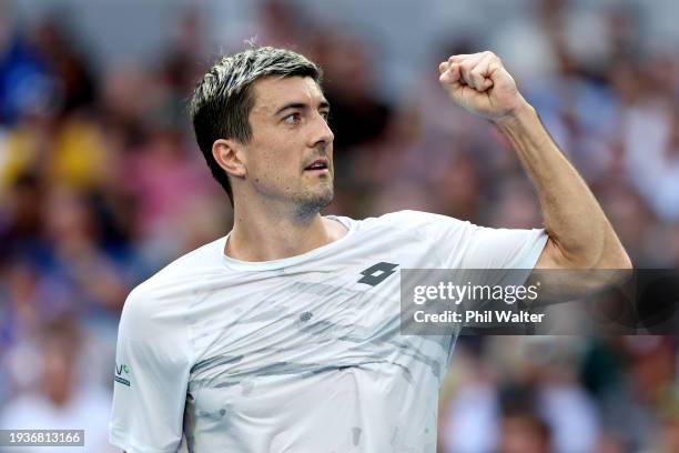 Sebastian Ofner of Austria celebrates winning set point in their round one singles match against Thanasi Kokkinakis of Australia during the 2024...