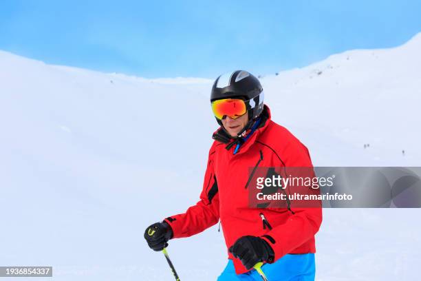 active lifestyle, portrait vital  senior men. happy  snow skier, enjoying on sunny ski resorts. snowcapped mountain  dolomite super ski area. ski resort italy, europe. - skikleidung stock-fotos und bilder