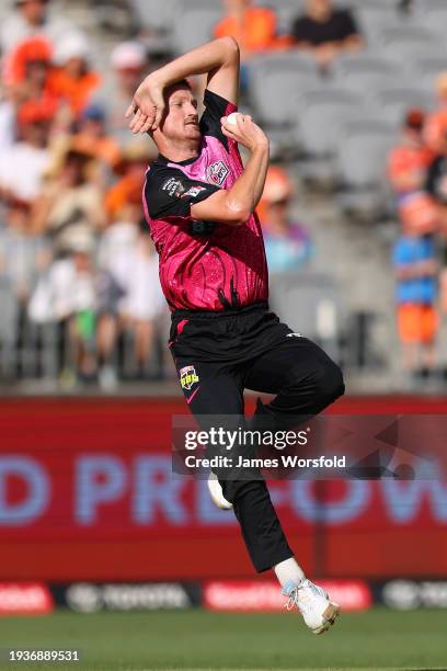 Jackson Bird of the Sixers bowling during the BBL match between Perth Scorchers and Sydney Sixers at Optus Stadium, on January 16 in Perth, Australia.