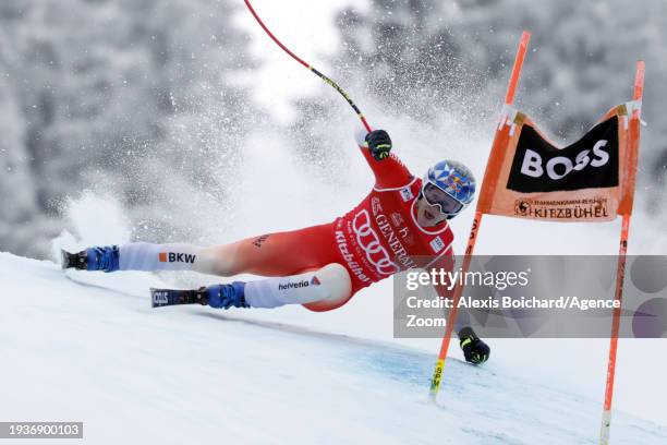 Marco Odermatt of Team Switzerland in action during the Audi FIS Alpine Ski World Cup Men's Downhill on January 19, 2024 in Kitzbuehel, Austria.