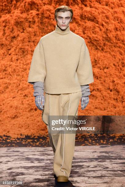 Model walks the runway during the Zegna Ready to Wear Fall/Winter 2024-2025 fashion show as part of the Milan Men Fashion Week on January 15, 2024 in...