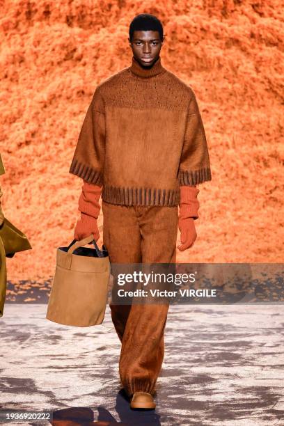 Model walks the runway during the Zegna Ready to Wear Fall/Winter 2024-2025 fashion show as part of the Milan Men Fashion Week on January 15, 2024 in...