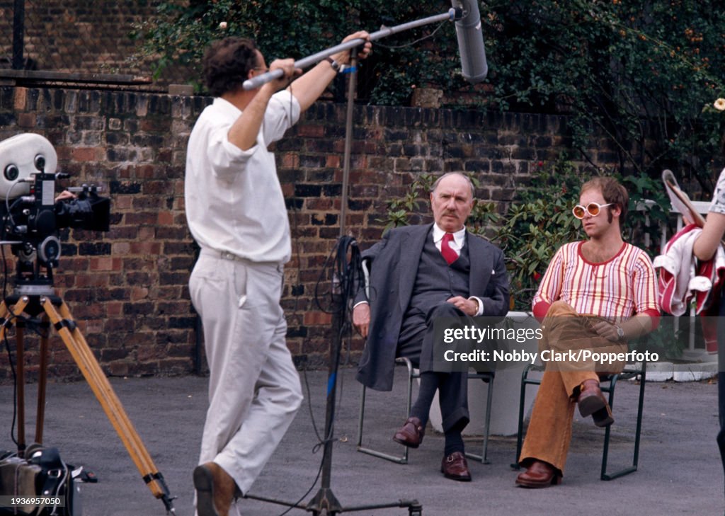 First Englis Actor Ralph English actor Sir Ralph Richardson filming with musician Elton John ...