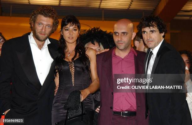 Italian actress Monica Bellucci, French actors Vincent Cassel , Albert Dupontel and Argentinian director Gaspar Noé leave the palais des festivals...