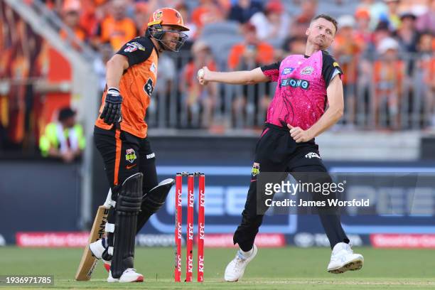 Jackson Bird of the Sixers bowling during the BBL match between Perth Scorchers and Sydney Sixers at Optus Stadium, on January 16 in Perth, Australia.