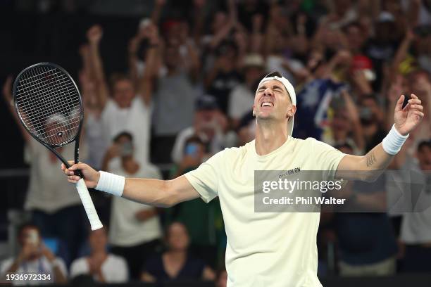 Thanasi Kokkinakis of Australia celebrates match point in their round one singles match against Sebastian Ofner of Austria during the 2024 Australian...