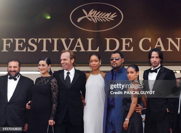 The cast of "Matrix Reloaded" with among them US actors Hugo Weaving , Keanu Reeves , actress Jada Pinkett-Smith and Canadian-born actress...