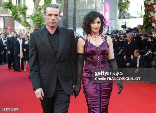 Italian actress Monica Bellucci and French actor Lambert Wilson arrive at the Palais des festivals to attend the world premiere of "Matrix Reloaded"...