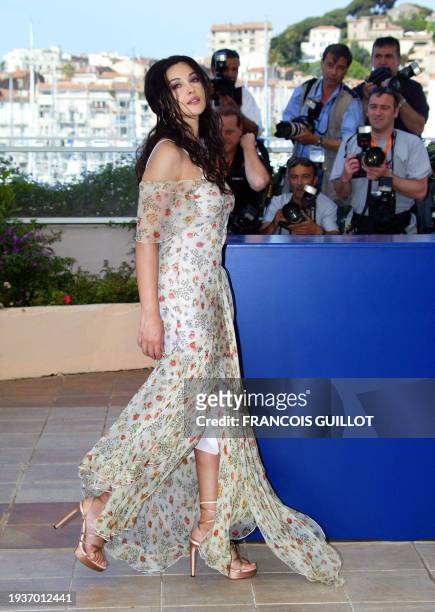 Italian actress Monica Bellucci arrives on a terrace of the Palais des festivals for the photocall of "Matrix Reloaded" directed by the Wachowski...