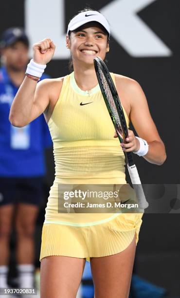 Emma Raducanu of Great Britain celebrates after winning in her first round match against Shelby Rogers of the United States during the 2024...