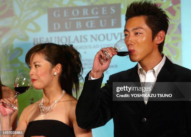 Kotaro Koizumi , an actor and son of Japanese Prime Minister Junichiro Koizumi and Japanese actress Megumi Yokoyama enjoy to taste the 2002 vintage...
