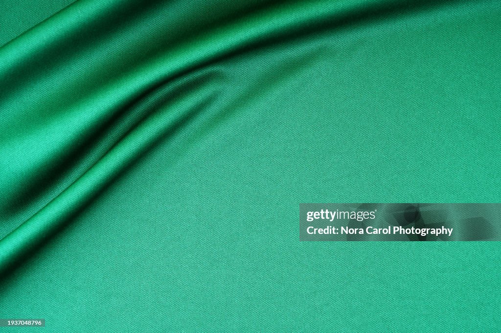 Emerald Green Silk Fabric Background
